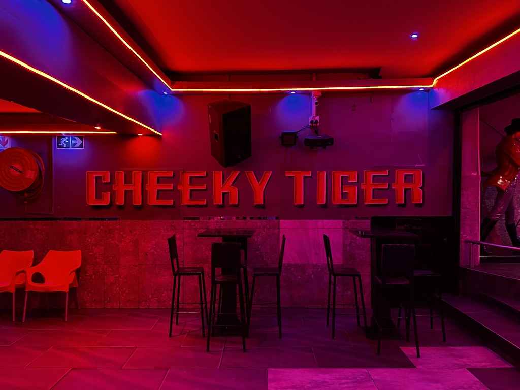 Cheeky Tiger red neon wall sign at Germiston