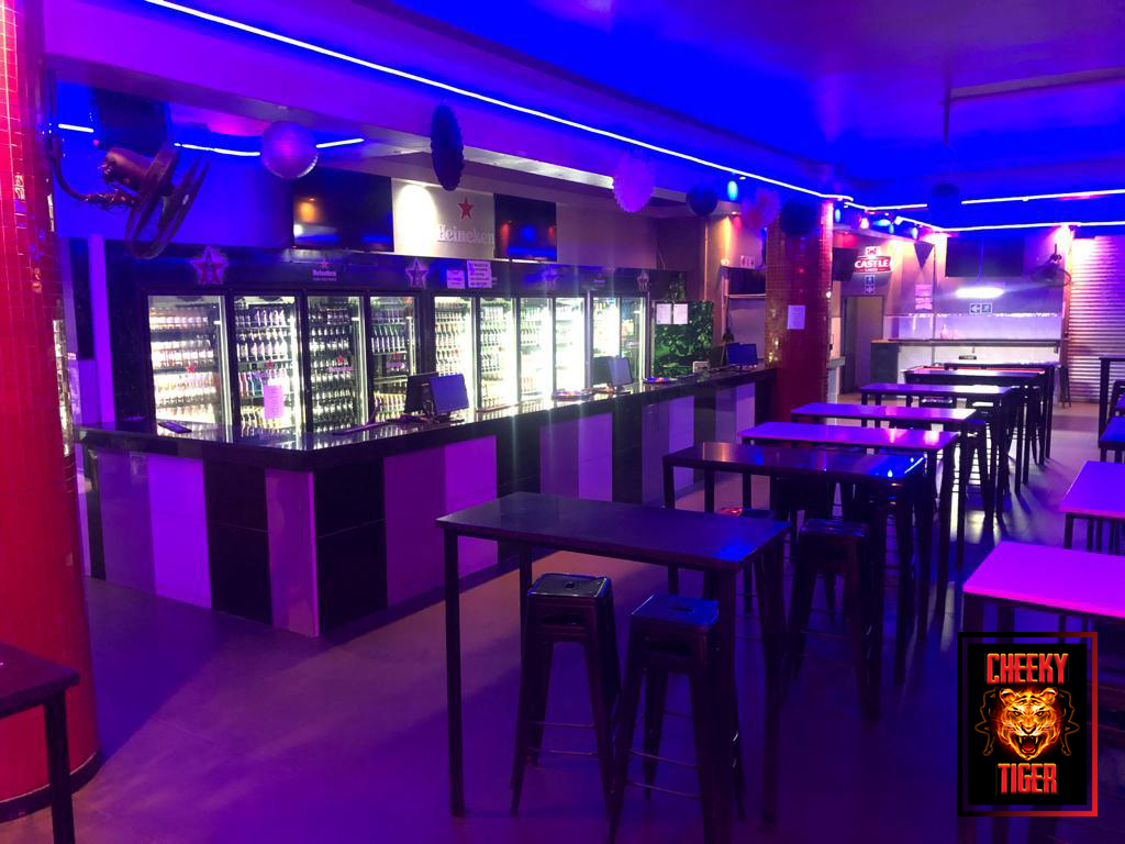 Heineken bar fridges and high tables at Cheeky Tiger Noord Street
