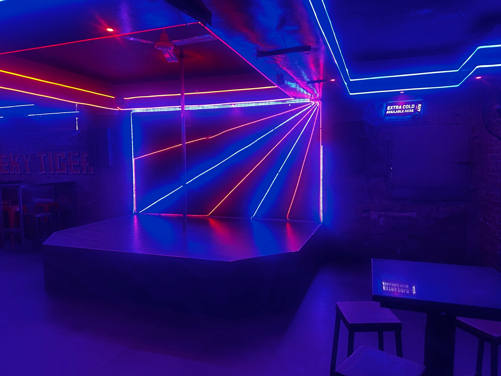 Centre stage with neon lighting at Cheeky Tiger Bree Street