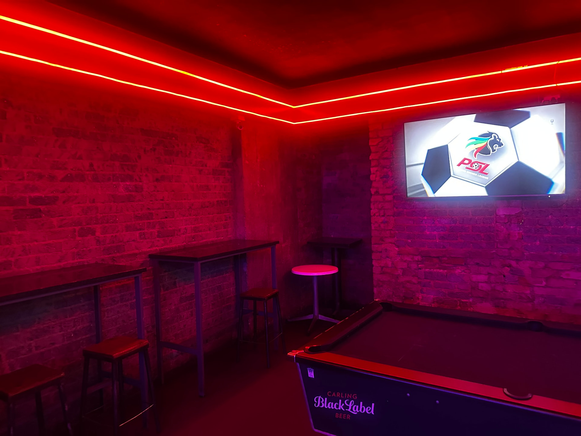 Pool table lounge with big screen at Cheeky Tiger Bree Street