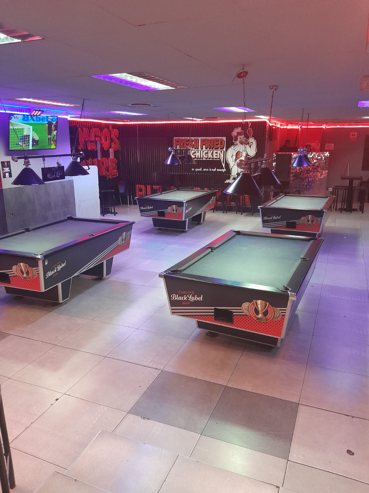 Pool lounge with Black Label tables at Cheeky Tiger Randburg