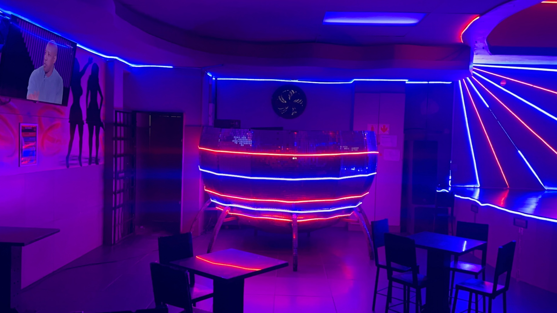 Neon-lit island bar and seating area at Cheeky Tiger Kempton Park